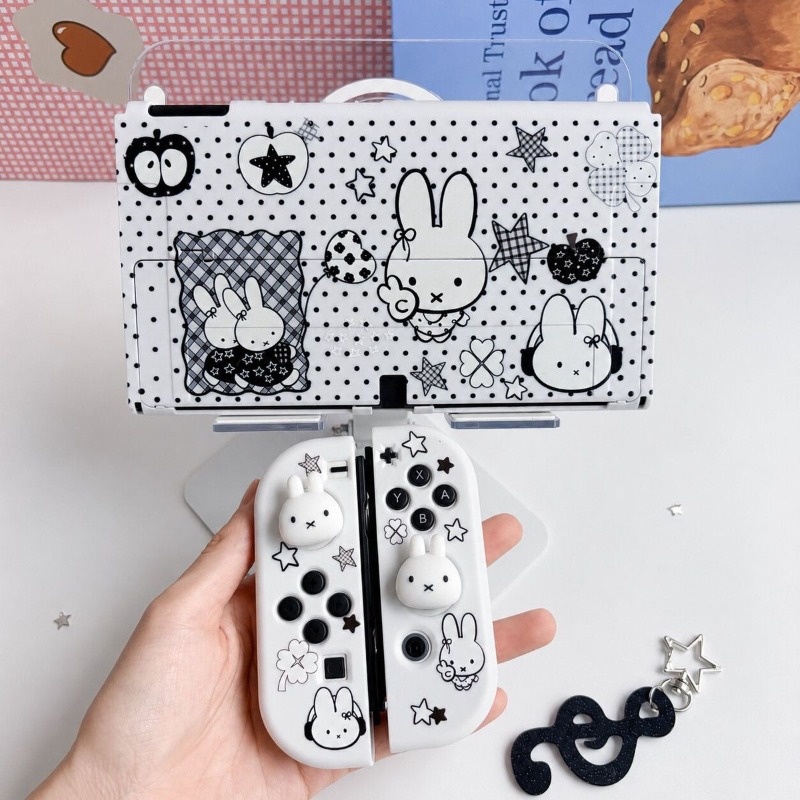 Gaming Console Tv - ニンテンドースイッチOLED用、かわいいミッフィーの保護ケース。ソフト素材の分割デザインで、コントローラーカバーと本体シェルを保護し、ゲームプレイを安全に。