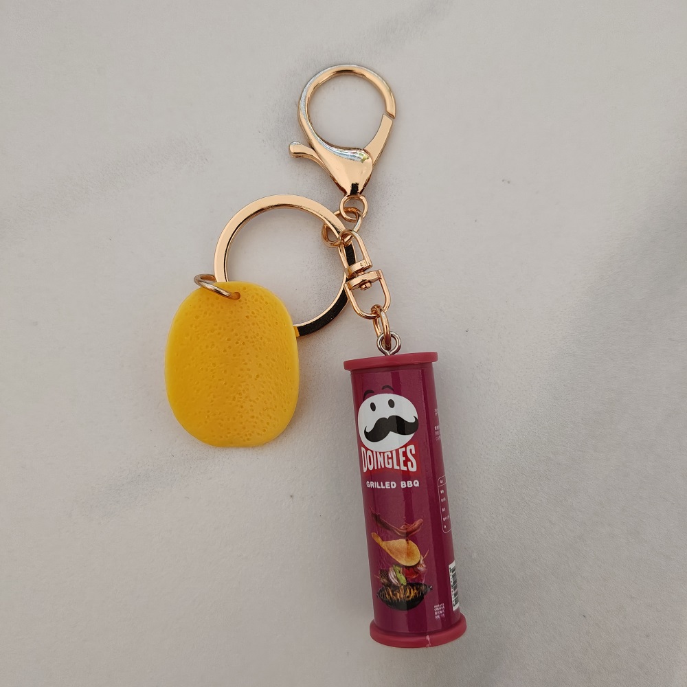 クリエイティブなポテトチップキーホルダー - リアルな樹脂製 - Gaming Console Keychain のレビューと価格